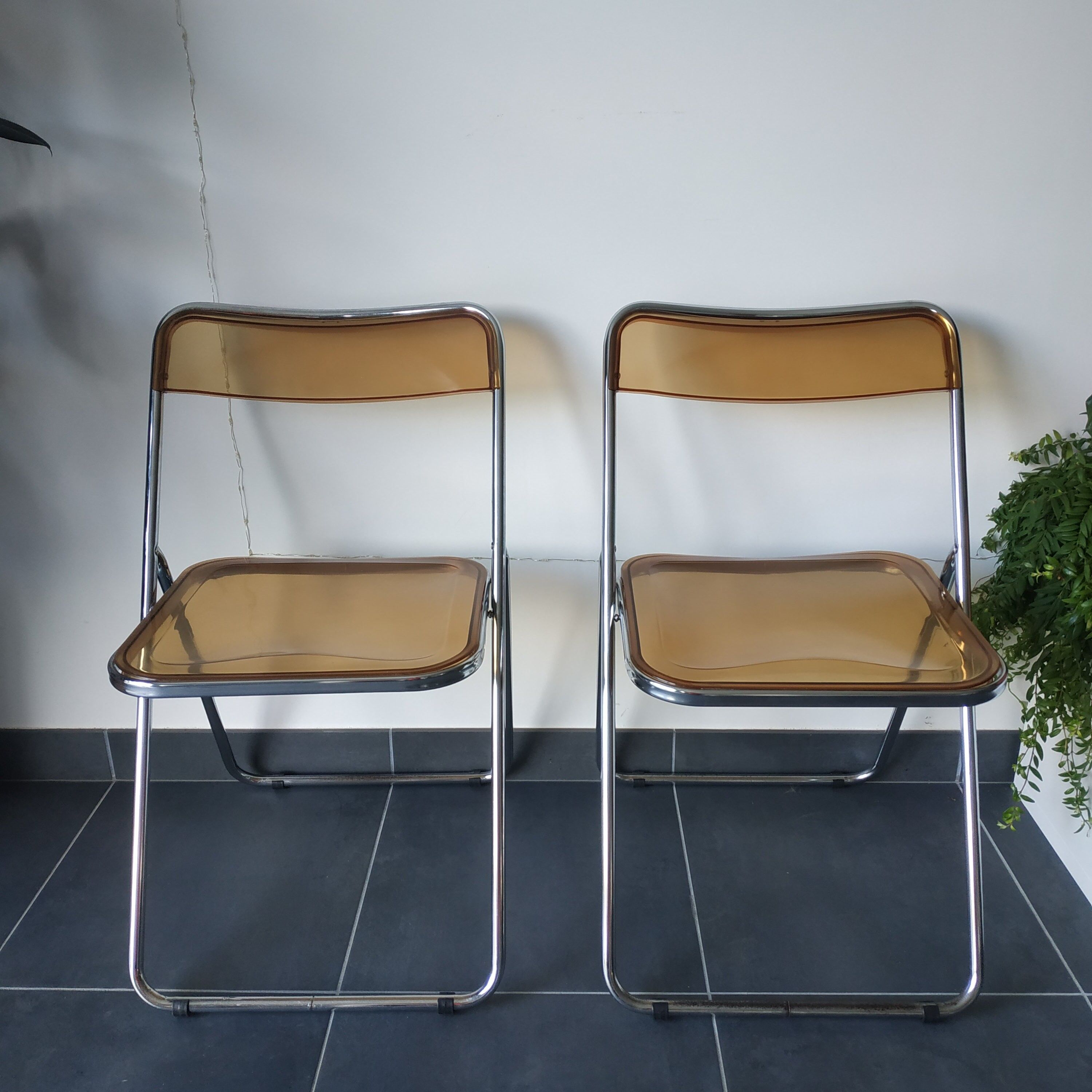 Seventies stainless steel and caramel chairs