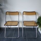 Seventies stainless steel and caramel chairs