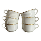 White and gold porcelain cups