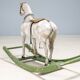 Antique wooden rocking horse, vintage toy with original patina.