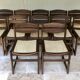 Set of 12 "sledge" dining chairs in walnut and cane.