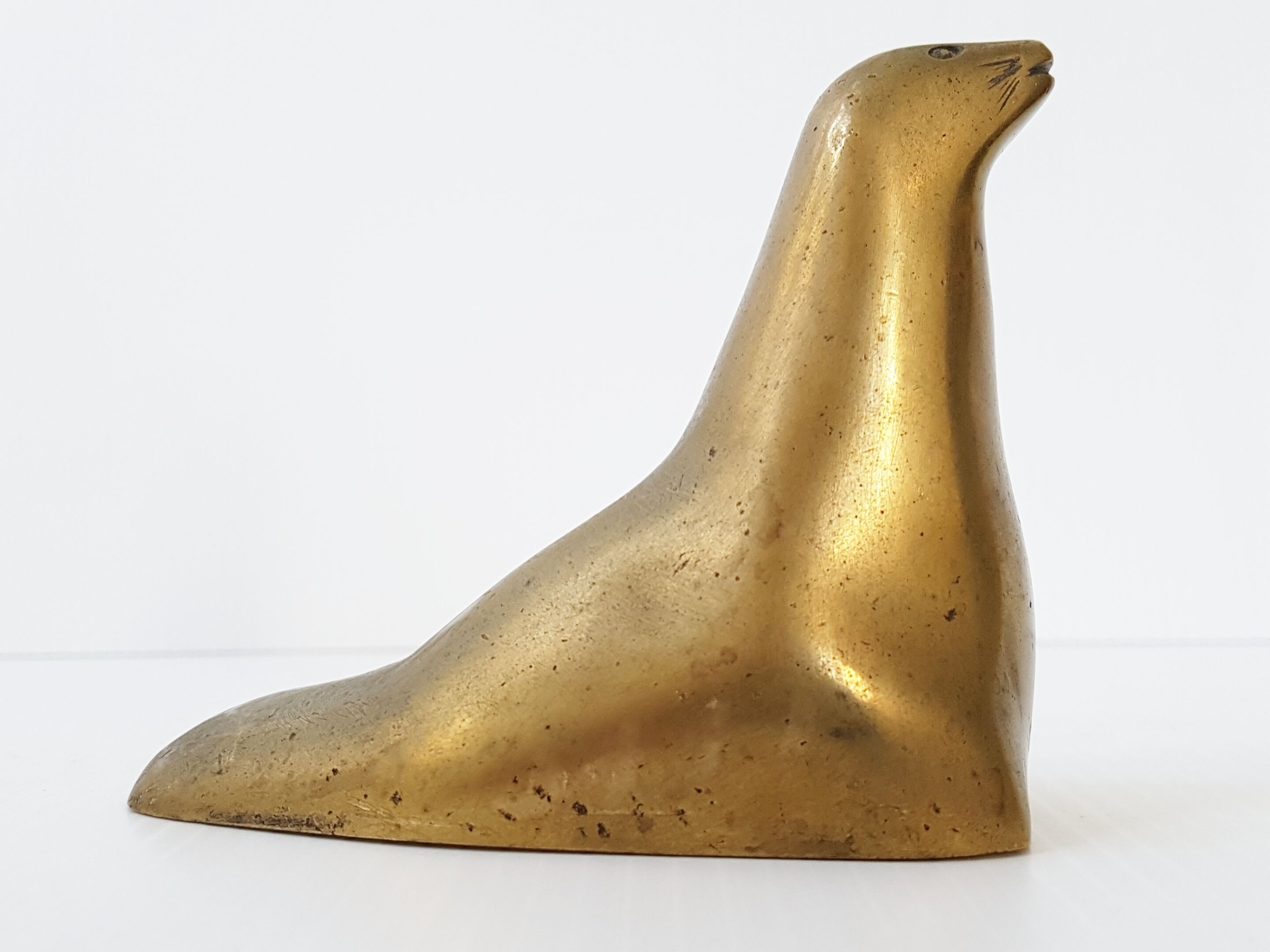 Gilt bronze sea lion 1970