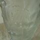 Frosted glass vase with a relief decoration of cherries.