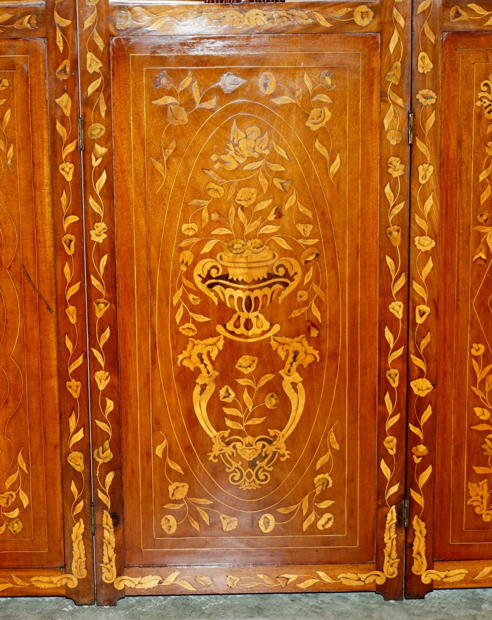 Pair of three-panel screens made of Dutch hardwood and walnut.
