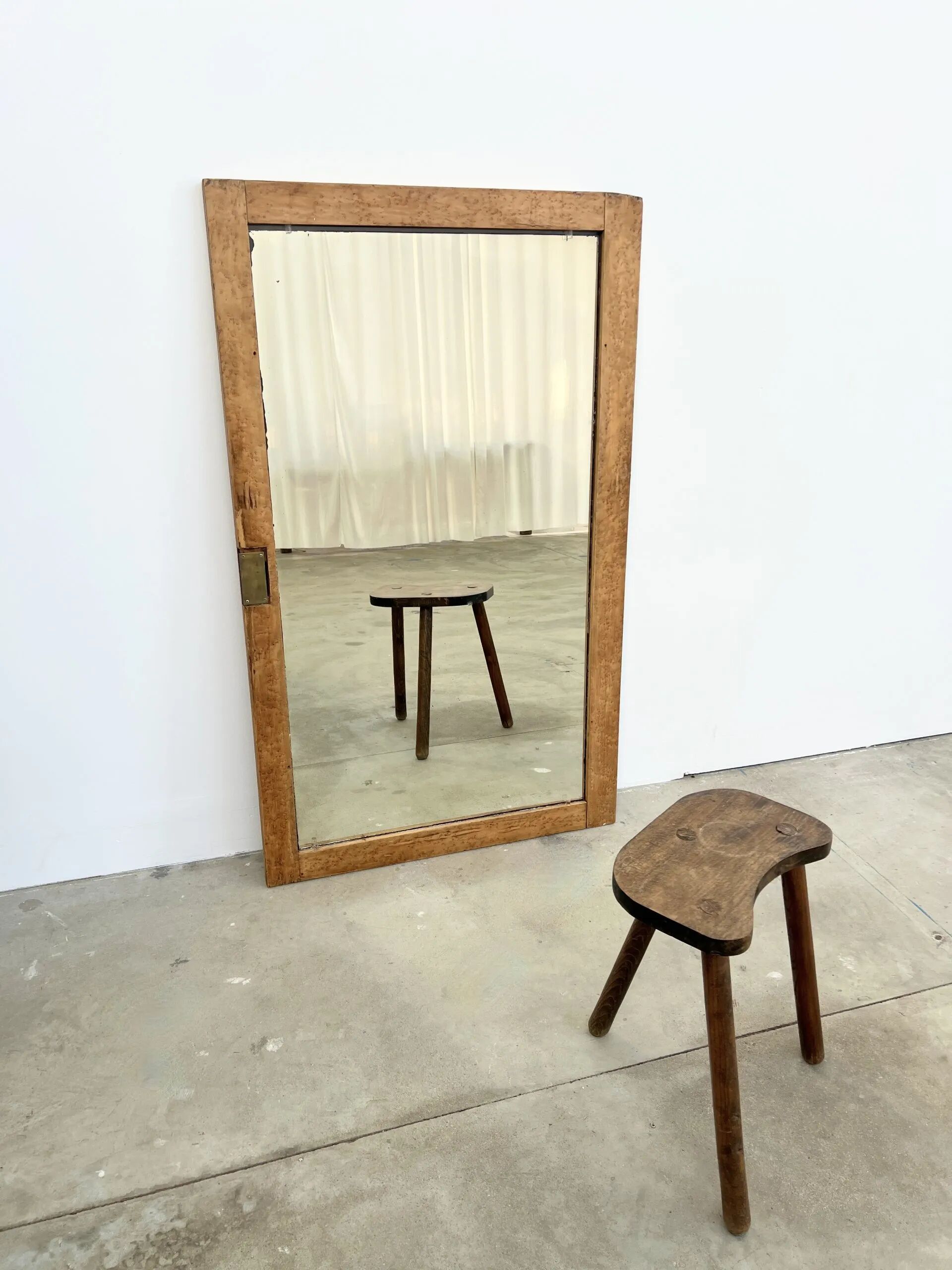 Antique mirror on an elm wardrobe door