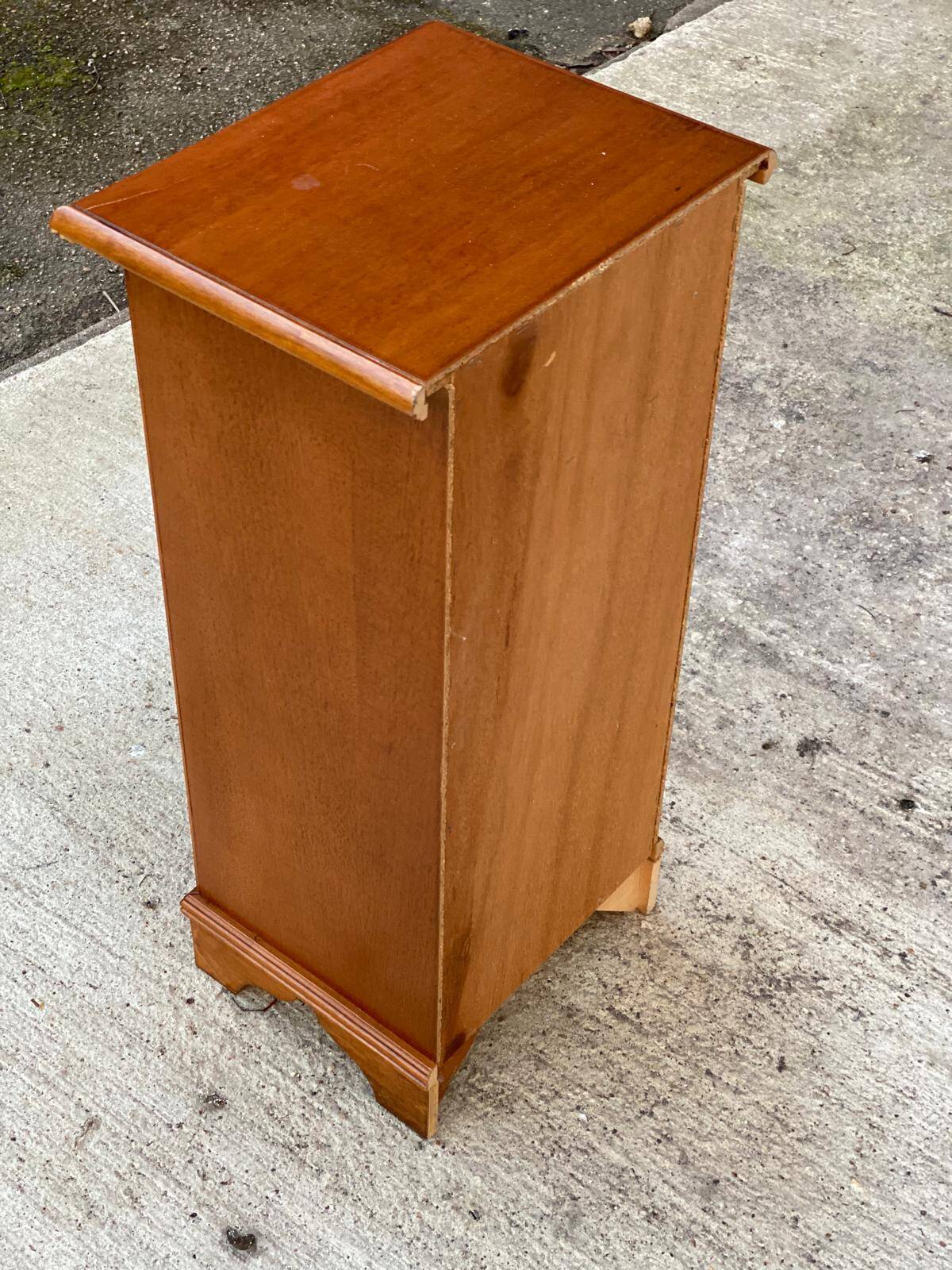 Solid wood bedside table with drawers and door