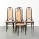 Ensemble de 4 chaises vintage originales en cannage design Thonet modèle Long John.