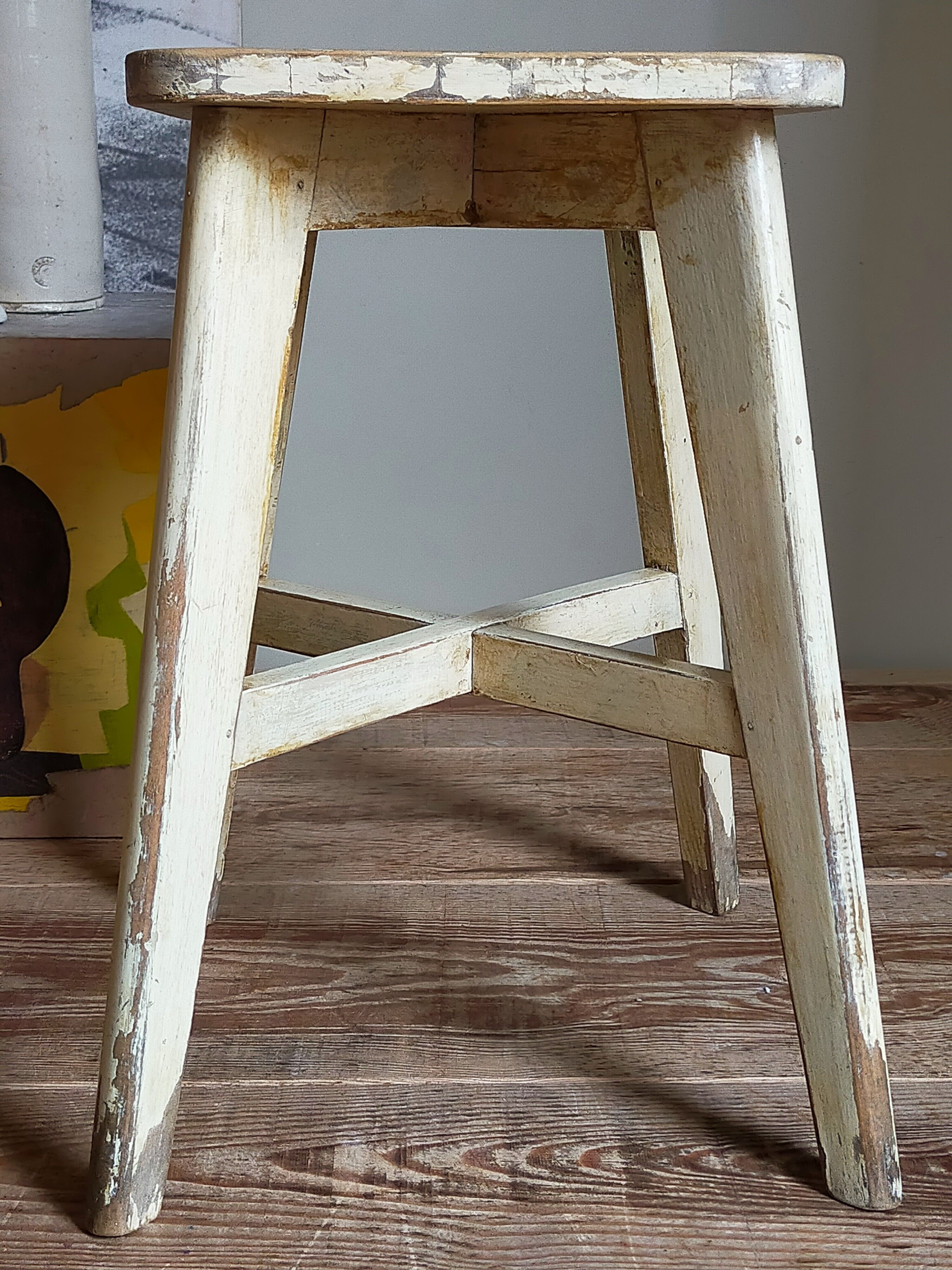 Old workshop stool in patinated solid wood