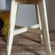 Old workshop stool in patinated solid wood
