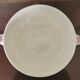 English soup bowl with purple floral motifs