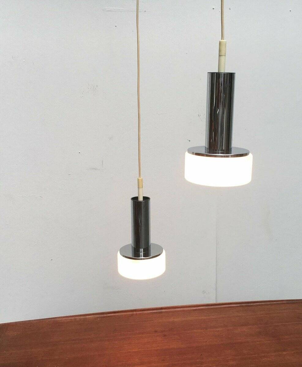 Suspended glass and chrome lamps model P105 German Mid-Century Space Age from the 1960s by Staff, set of 2.