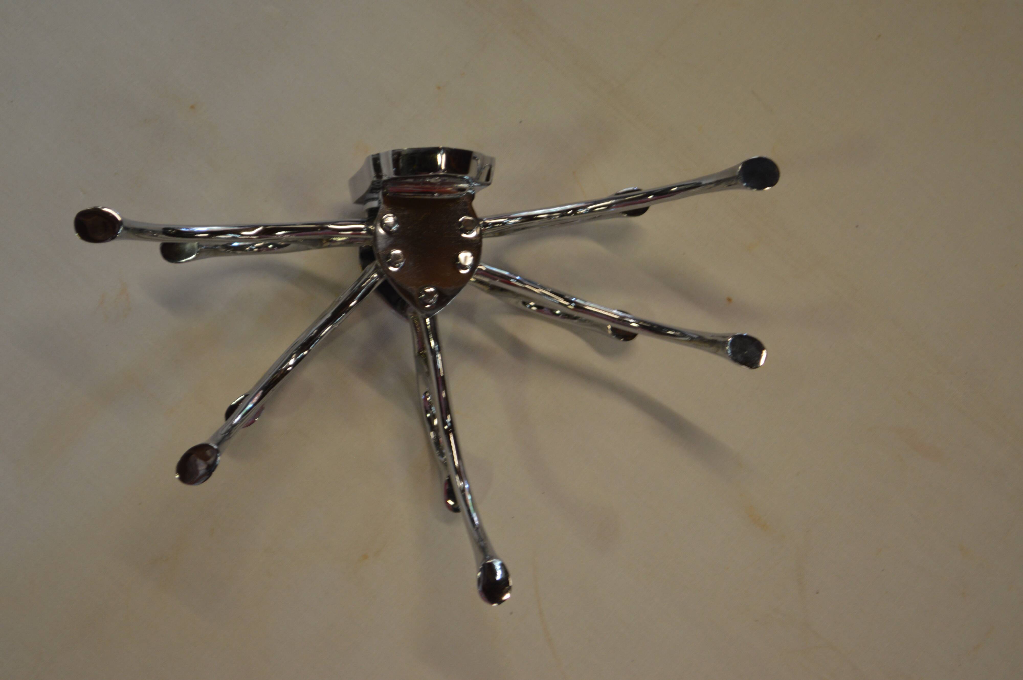 Chrome iron circular coat holder