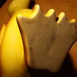 Ceramic watering can in white earthenware, yellow enamel and bird shape