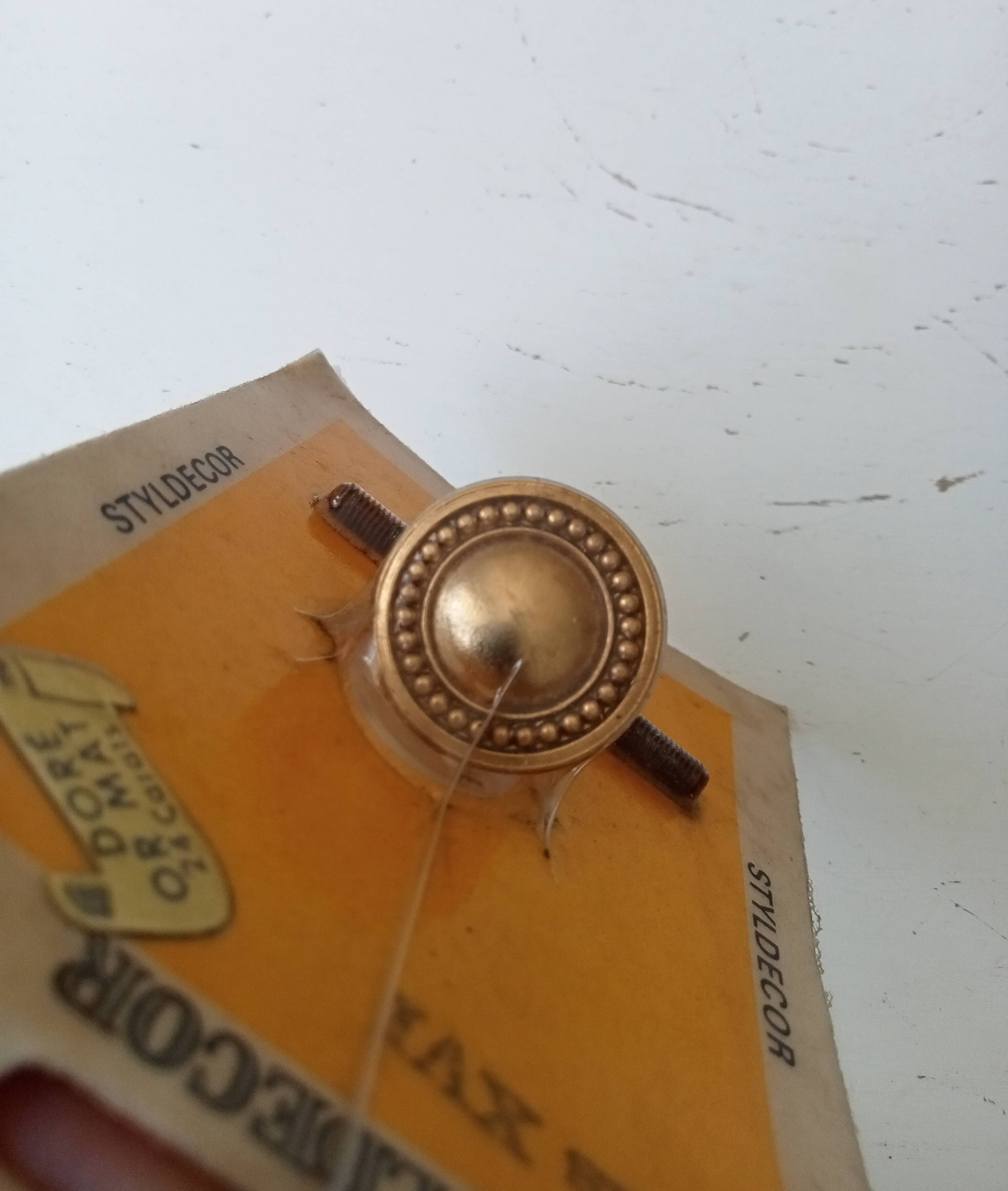 Vintage furniture knob in Louis XVI style, gilded with fine gold.