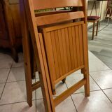 Pair of vintage folding wooden chairs