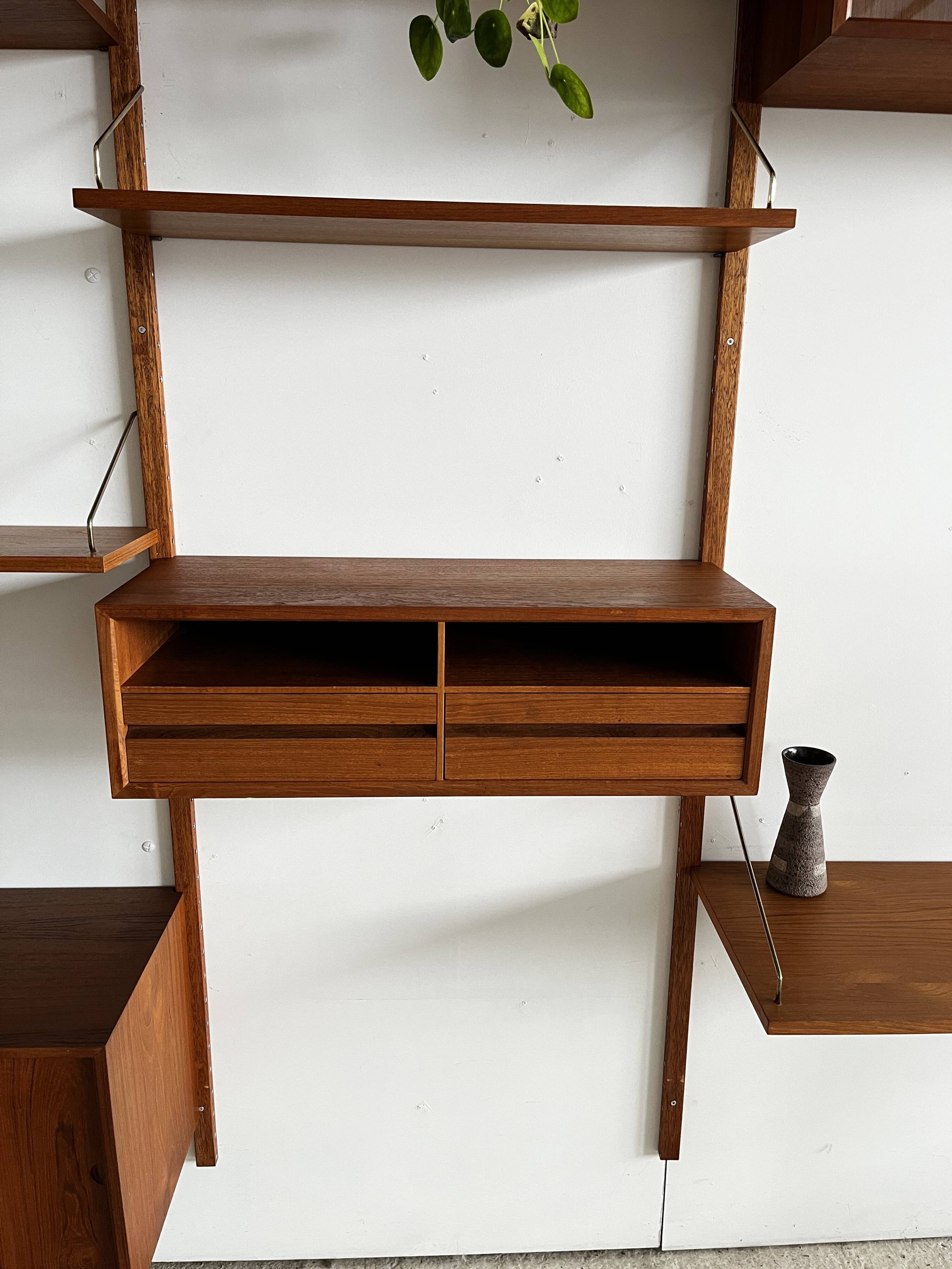 A wall unit with 4 compartments by Poul Cadovius, Denmark, 1960s.