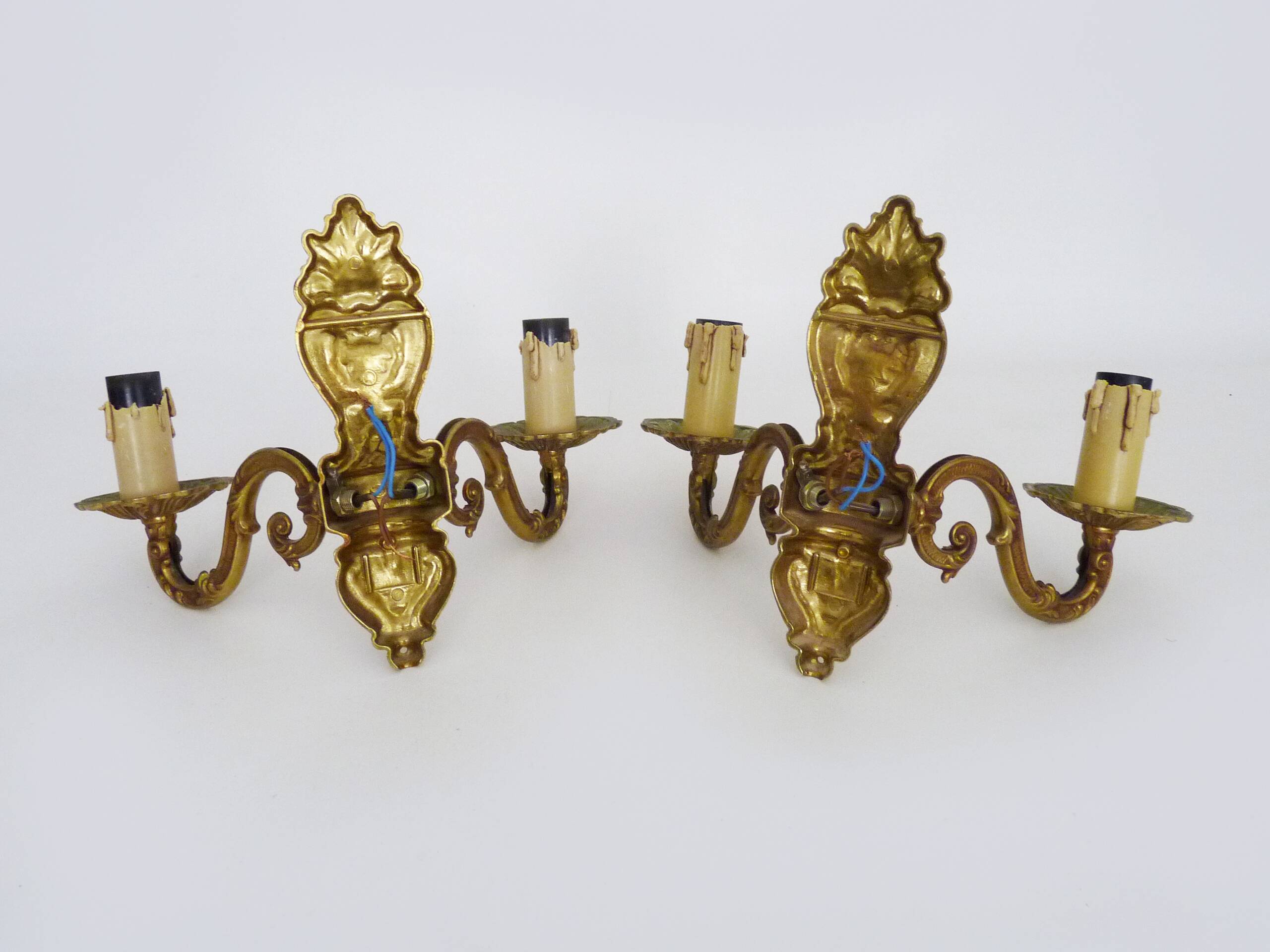 Old pair of double-light brass wall sconces. 60s