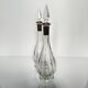 Pair of crystal decanters with solid silver mounts