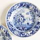 Five 19th century Calais earthenware plates with a romantic gallant couple decor
