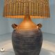 Large amphora floor lamp in pottery with a rattan shade from the 1960s.