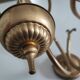 Antique brass wall sconce with two arms, Louis XV style.