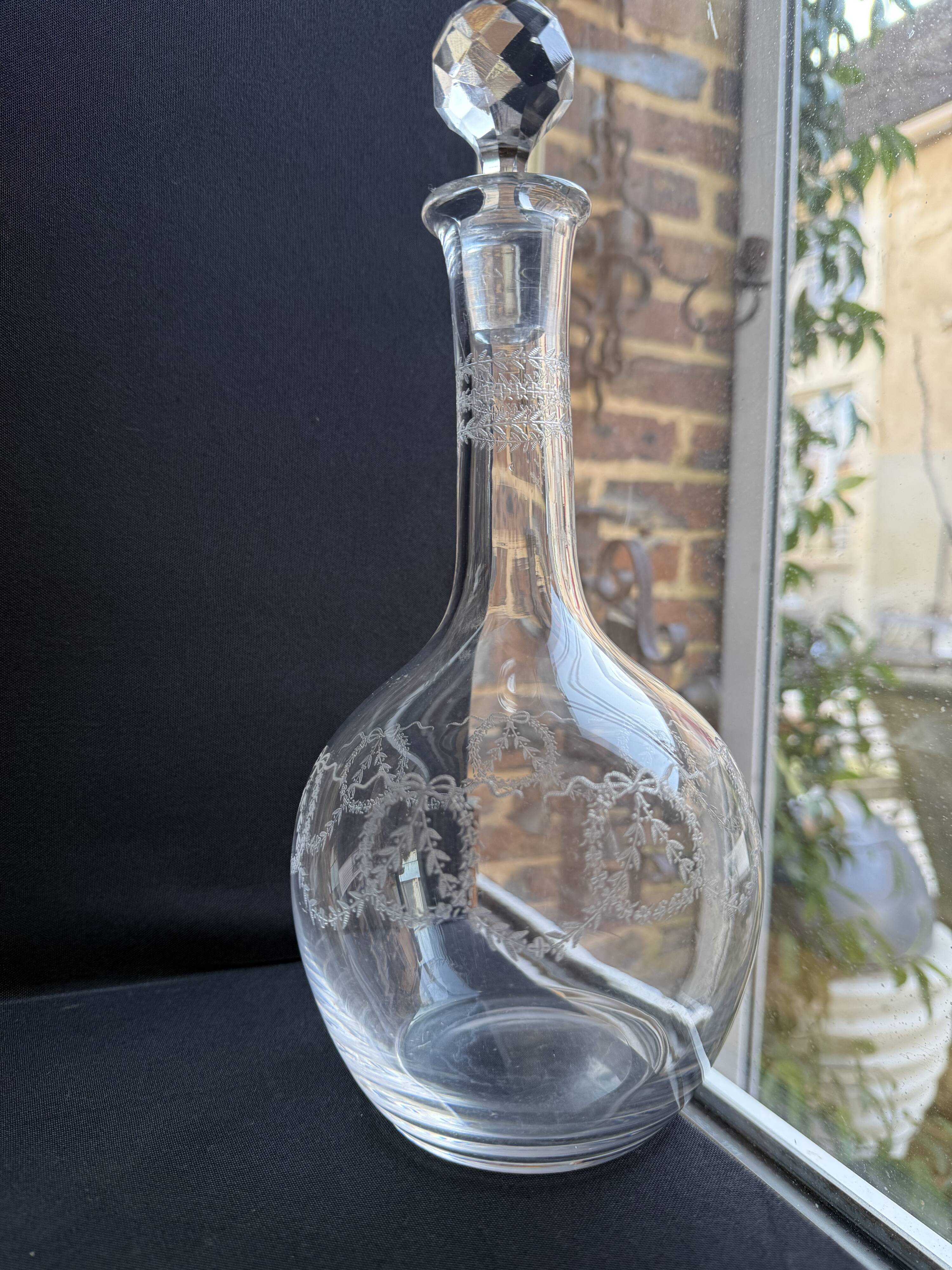 Cut crystal carafe with silver frame