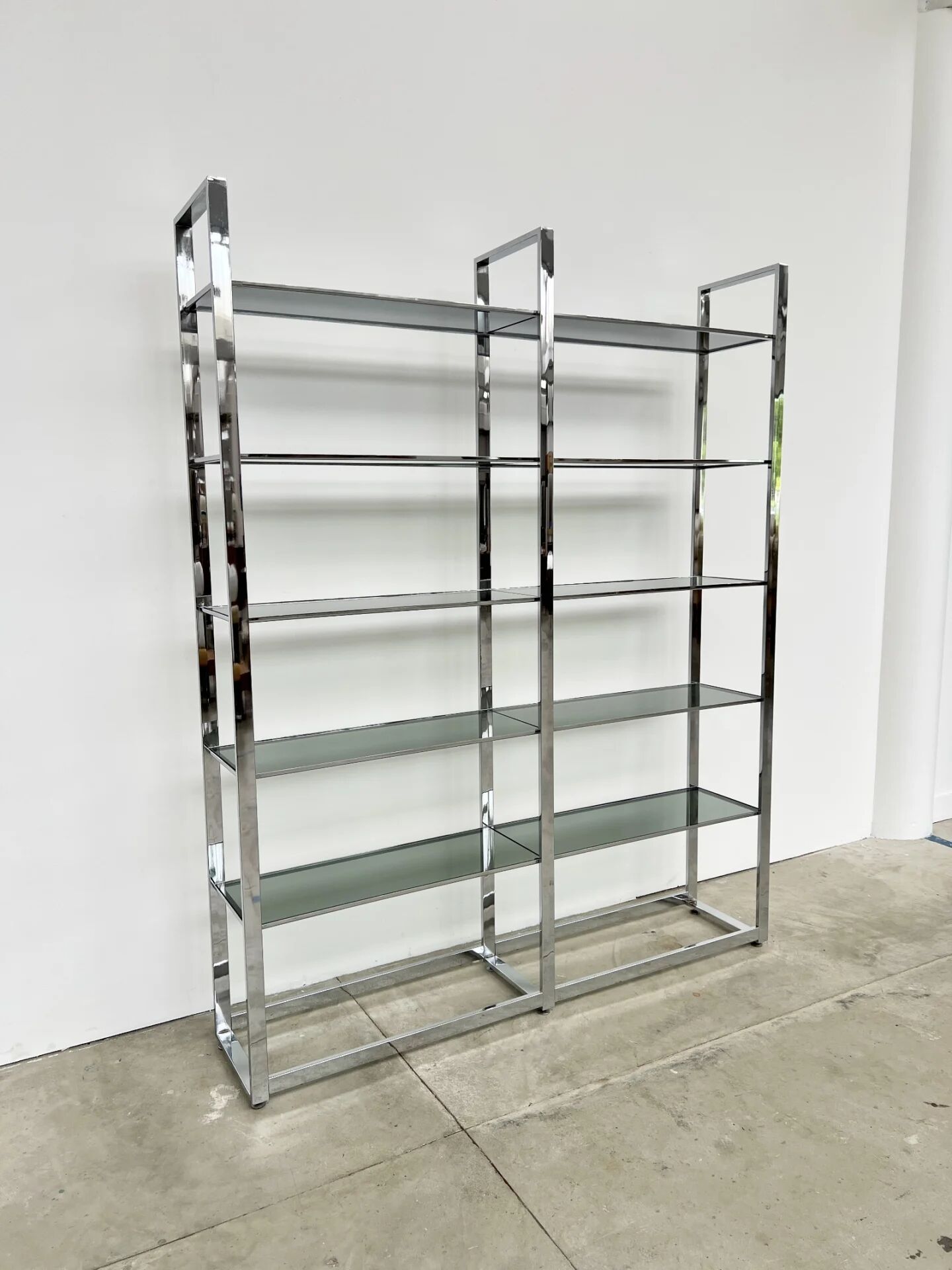 Chrome bookshelf with smoked glass — Italy, 1970s