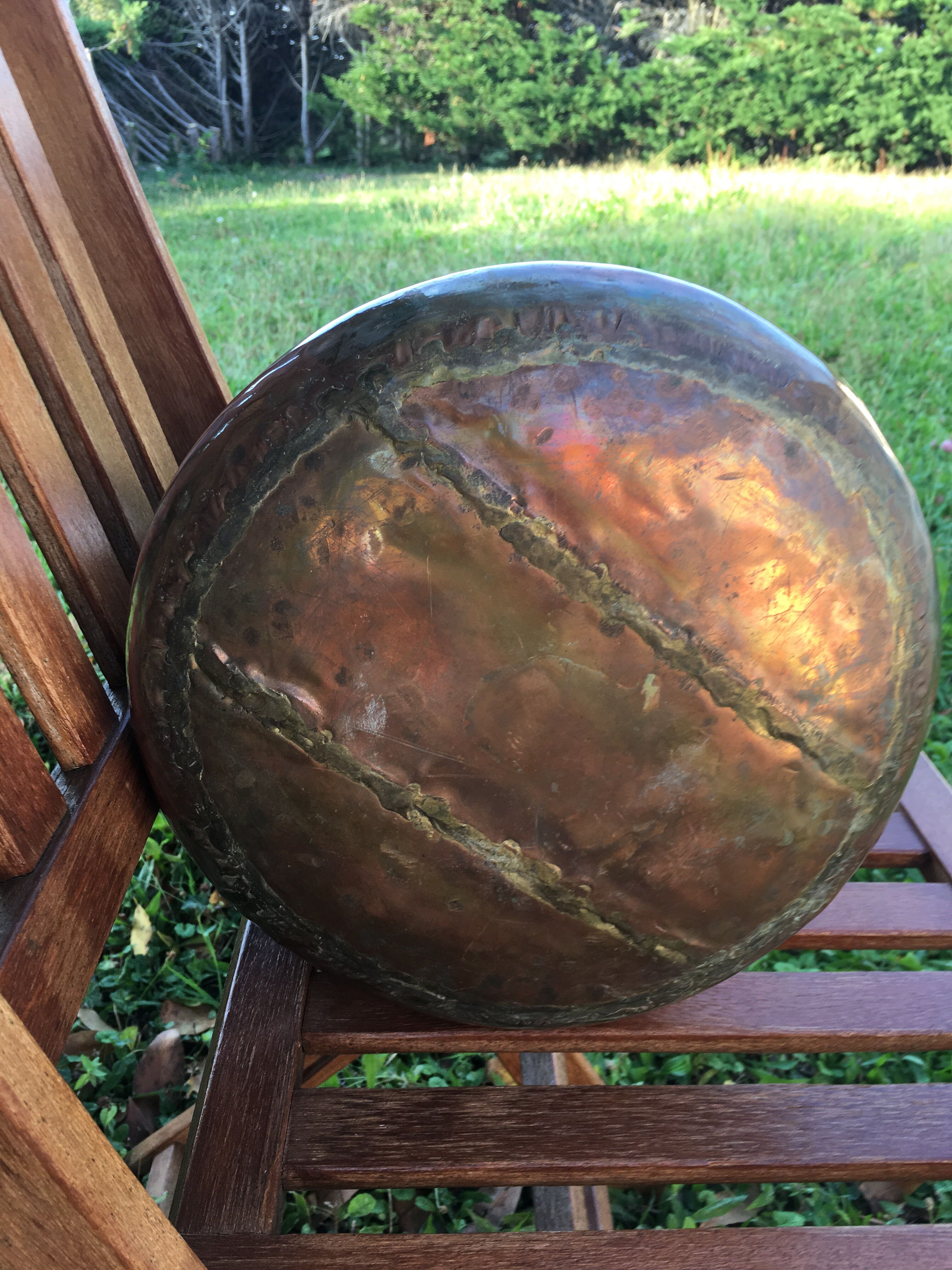 Old copper pot cover