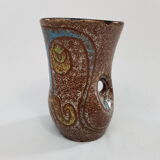 Accolay décor of face ceramic vase