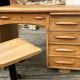 Antique light oak desk from the 1950s with 4 drawers
