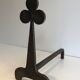 Pair of wrought steel and iron chenets with clover decorations 1950
