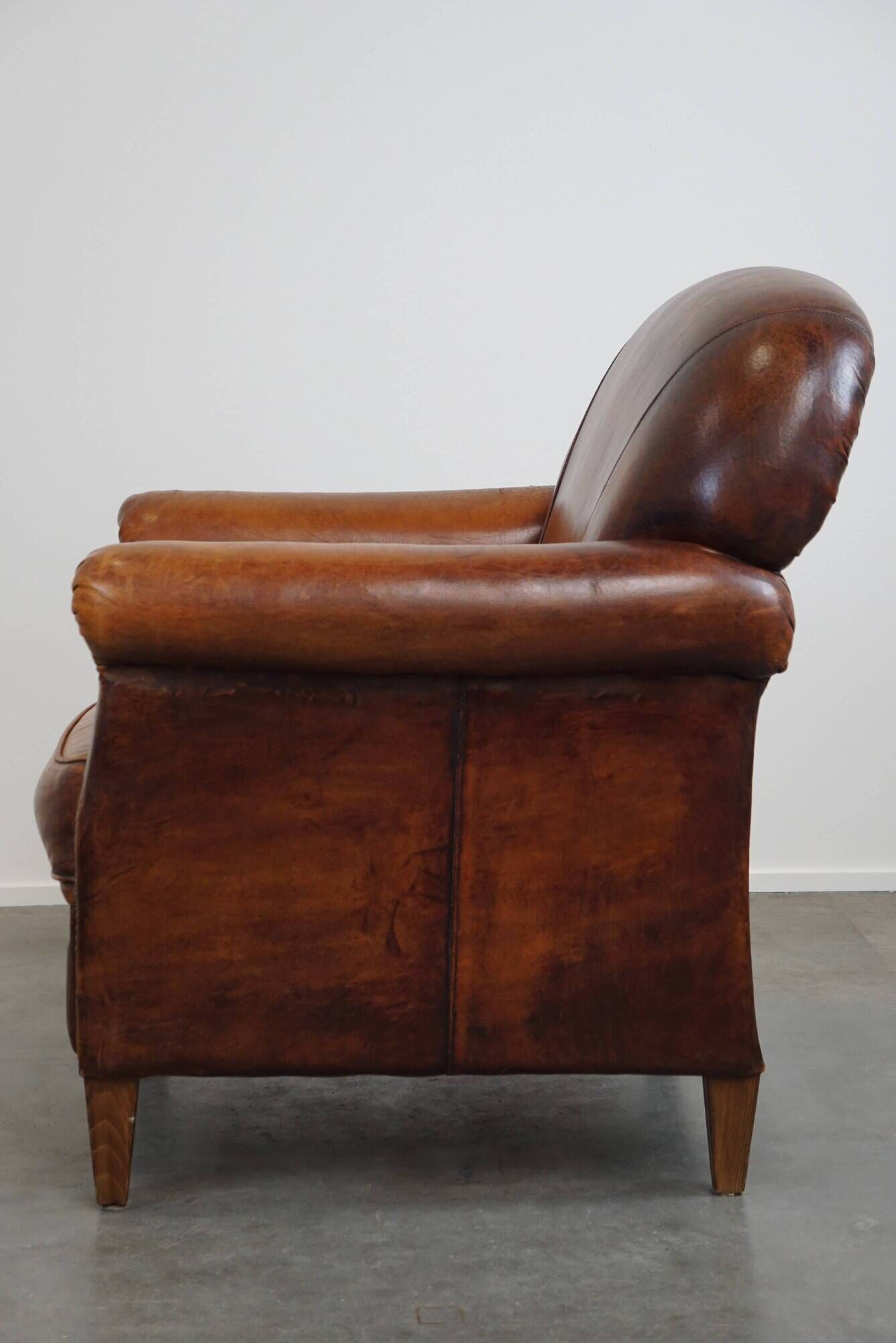 Beautiful sheep leather armchair with fixed cushion and stunning colors