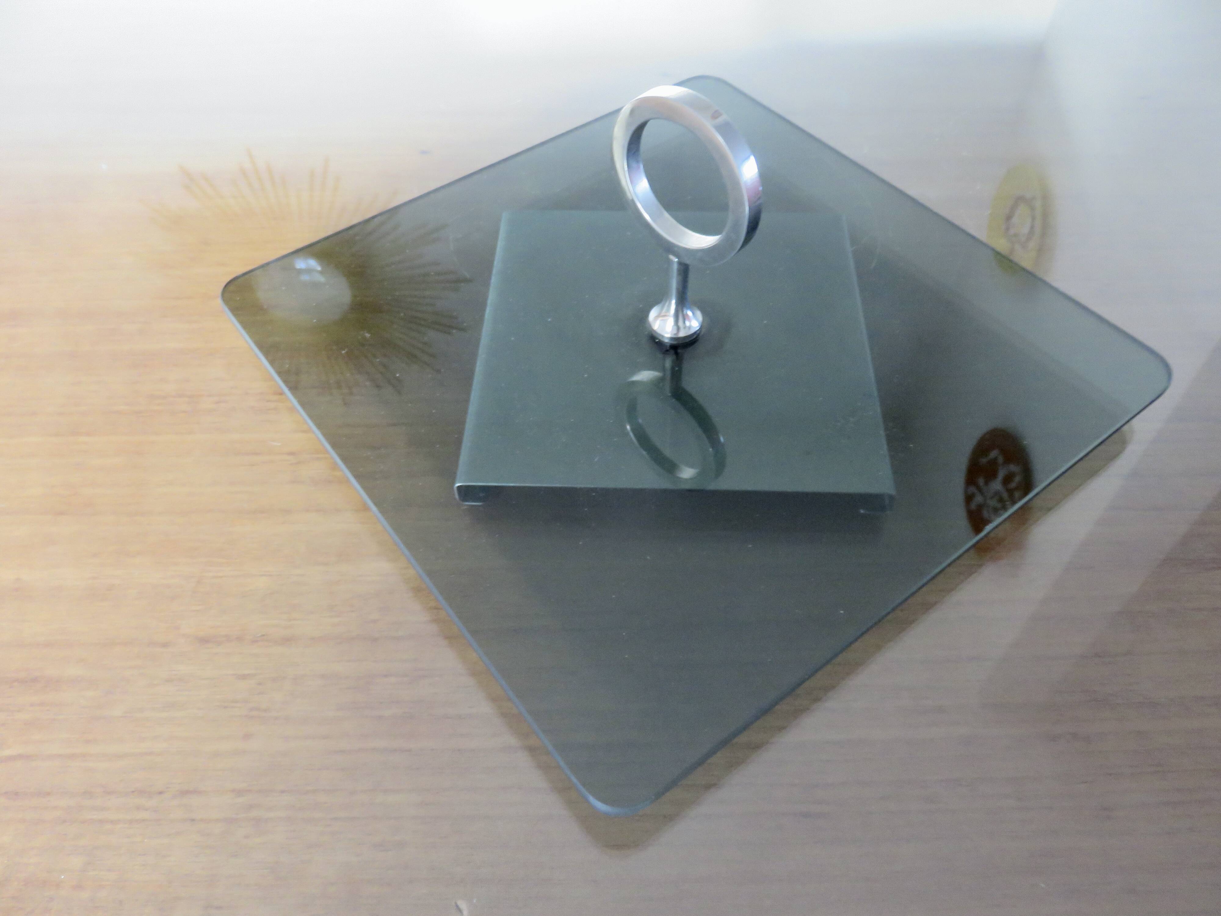 Modernist revolving serving tray, in smoked glass and silver-plated metal, 70.