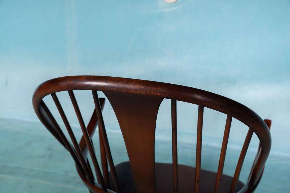 Ercol model 472 fireplace chair from the 1960s in beech.