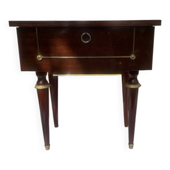 Nightstand with lovely mid-century style gold metal decor.