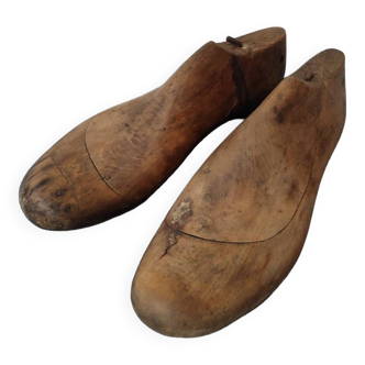 Shoe trees shaped like a shoemaker