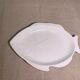 Serving dish in the shape of a white glazed ceramic fish