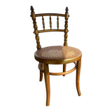 Children's chair in cane and curved wood