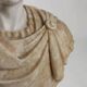 Bust of a Roman emperor in white marble, Italy, 20th century.