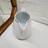 White and gold porcelain pitcher