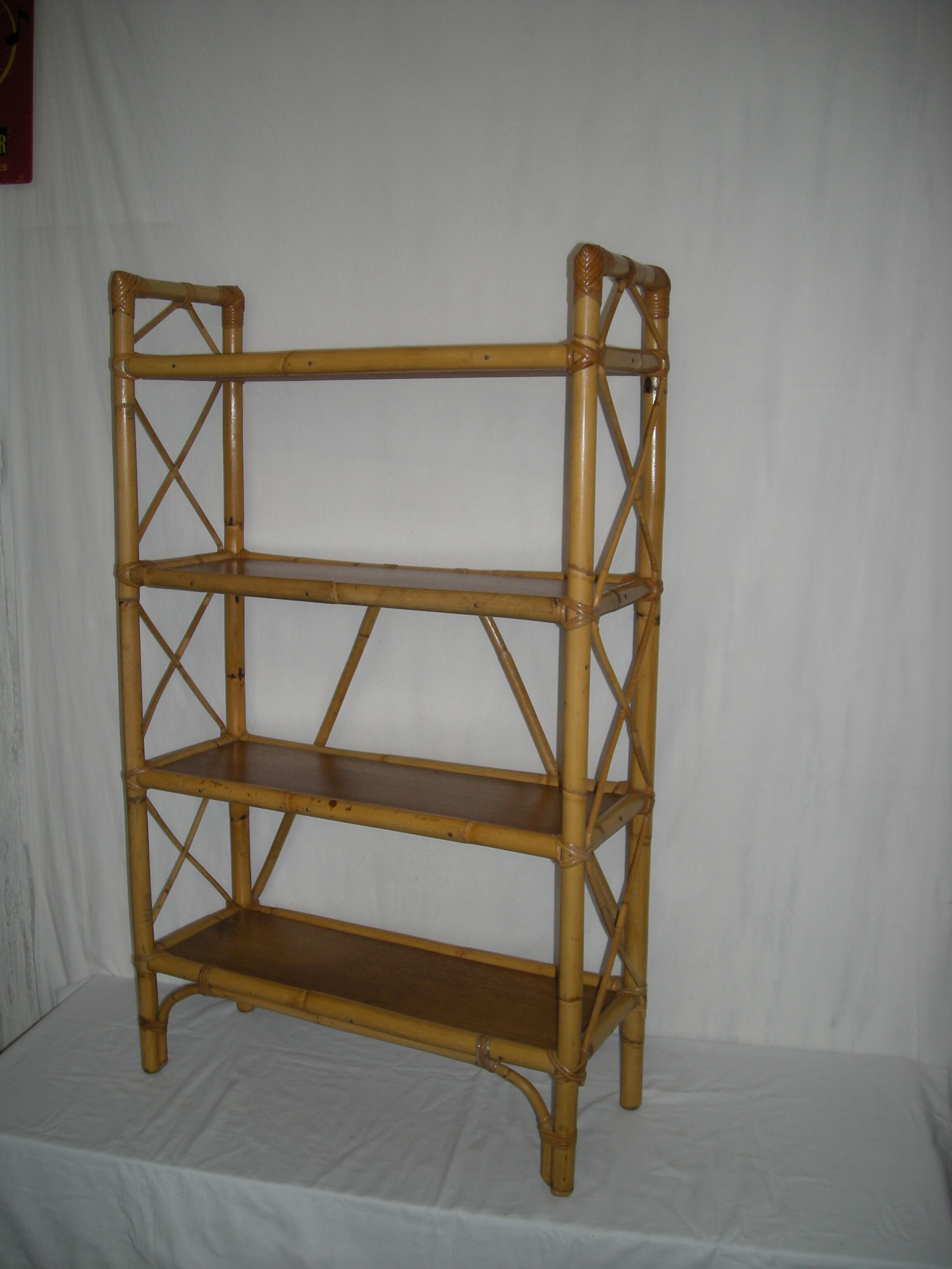 Rattan bamboo shelf on feet from the 50s 60s