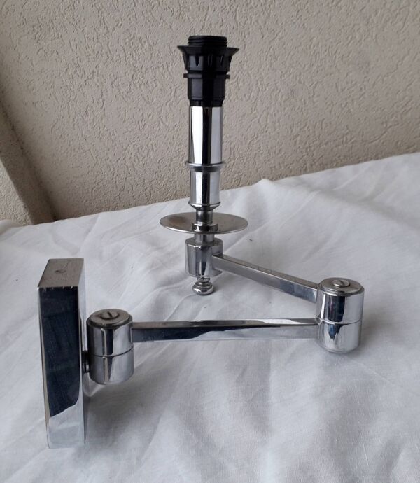 Applique à bras articulé