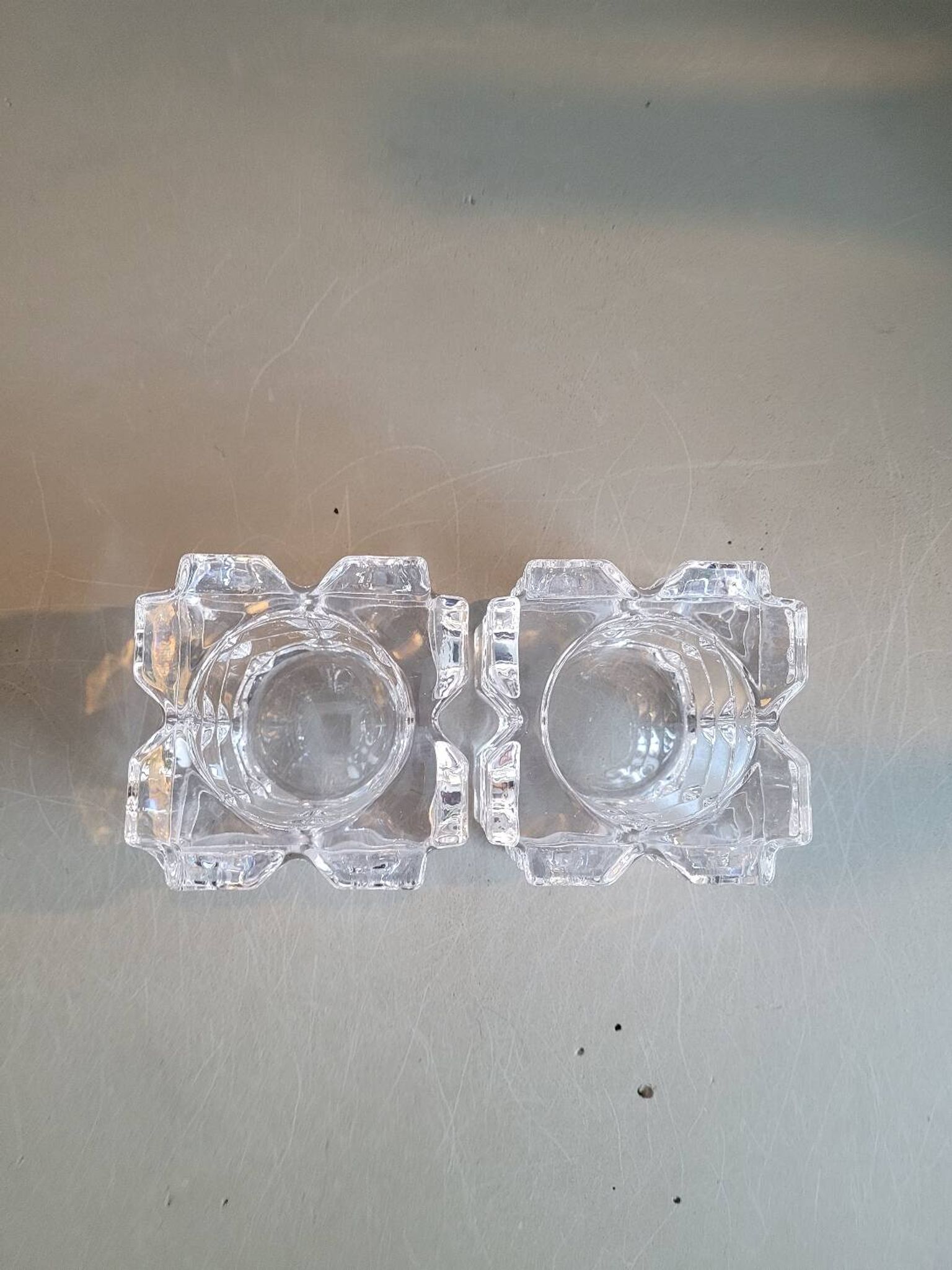 Pair of faceted glass tealight candle holders