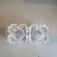Pair of faceted glass tealight candle holders