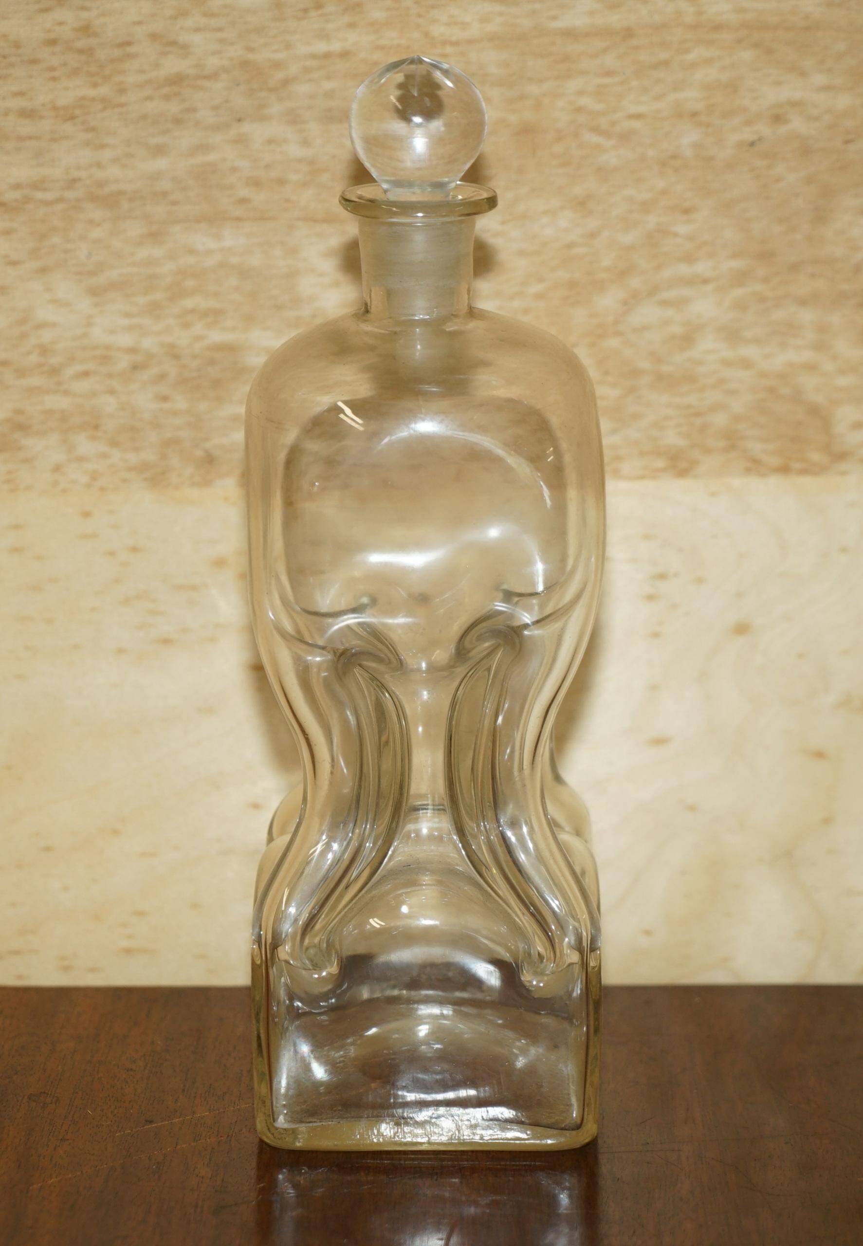 Pair of antique pinched decanters circa 1900 for serving whisky, bourbon, vodka, gin.