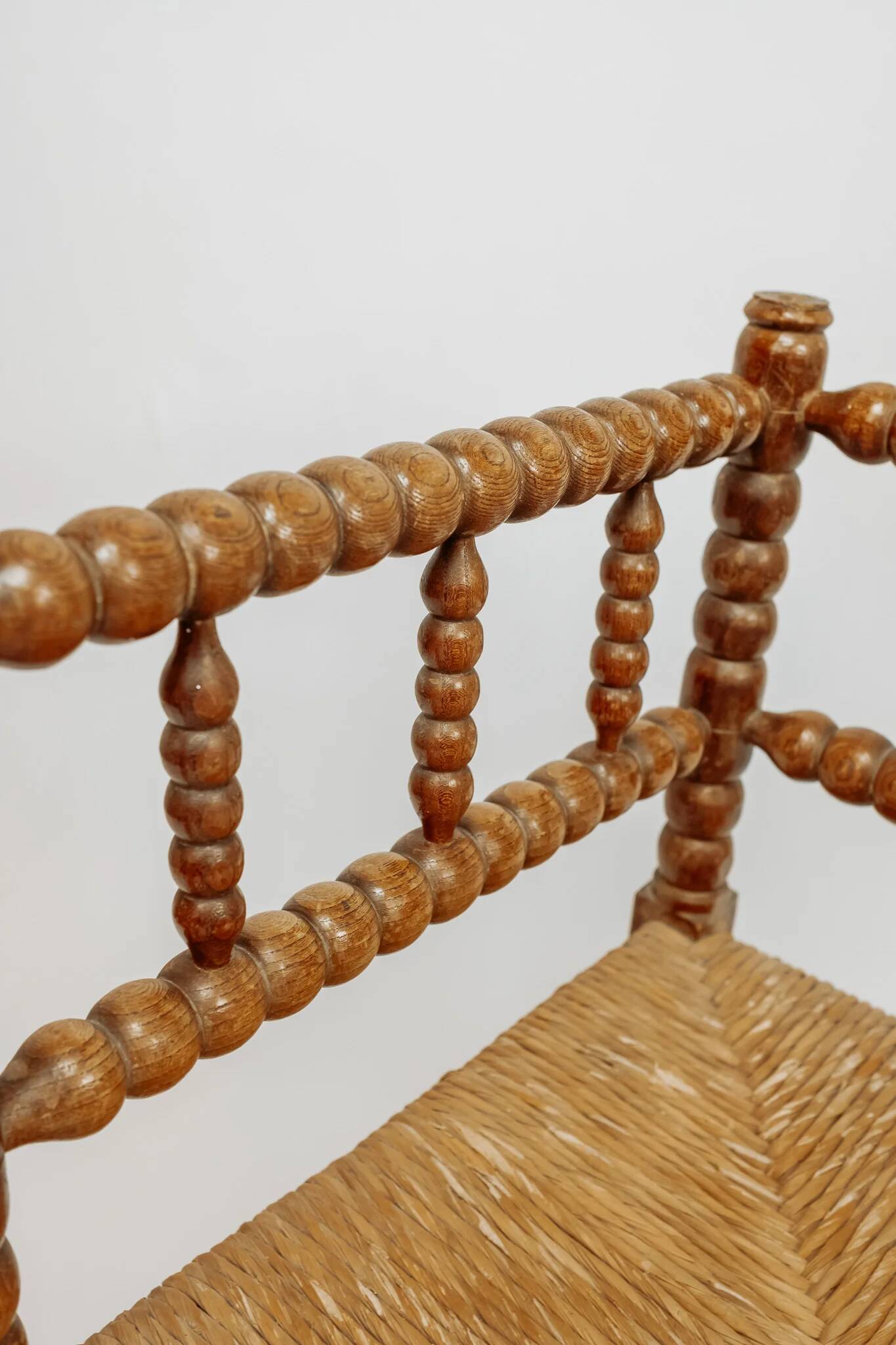 Classic vintage bobbin corner armchair