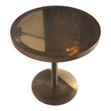 Round wooden and brass table
