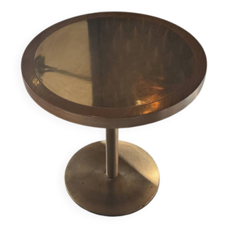 Round wooden and brass table