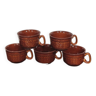 Caramel brown ceramic mugs with geometric flower pattern from the 70s