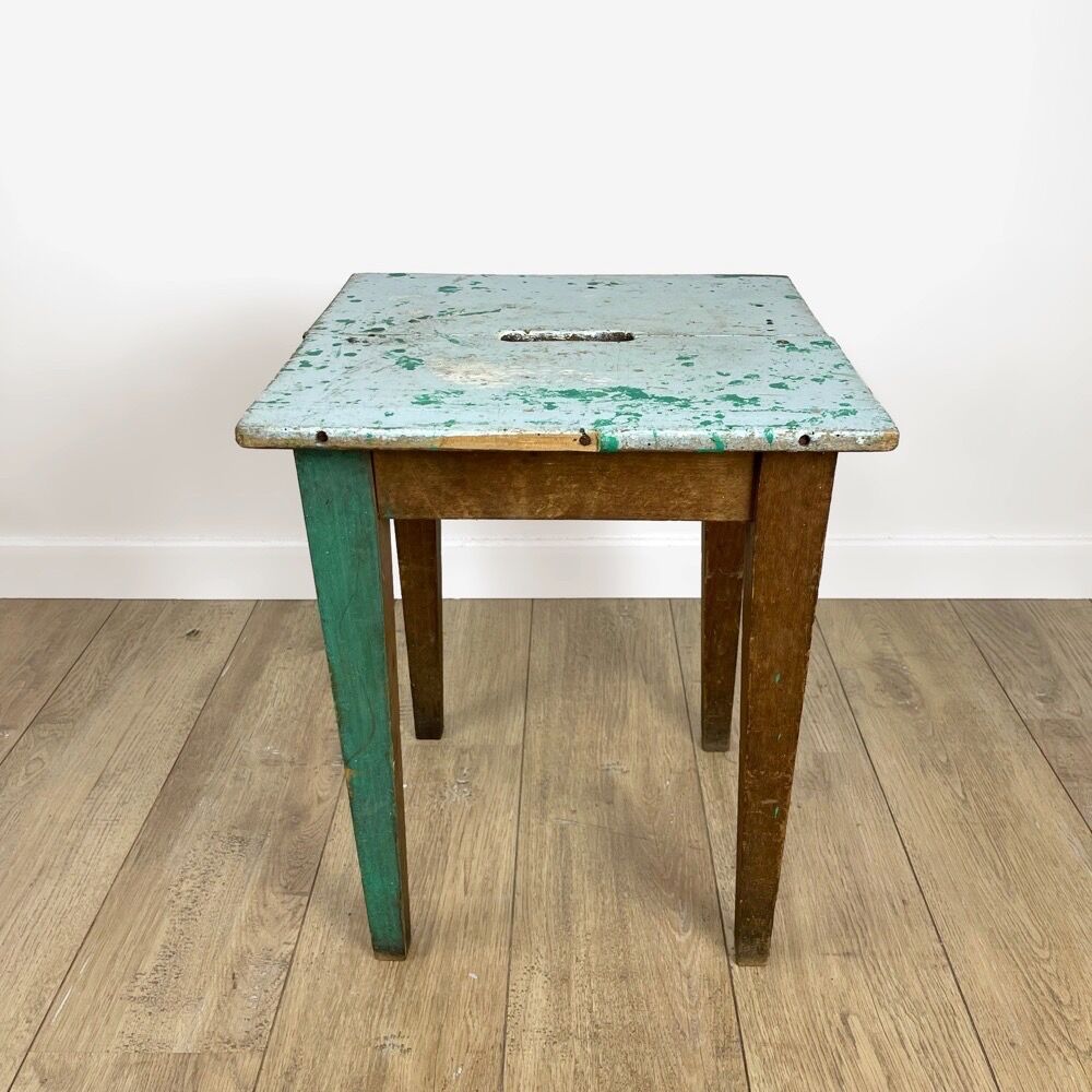 Old wooden slot stool